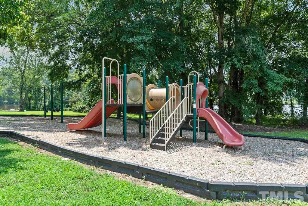 3308 Castlegate Drive Raleigh, NC 27616 - Photo 21 of 22 a view of a park with slide