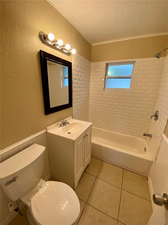 38313 Tucker Road Zephyrhills, FL 33542 - Photo 22 of 46 a bathroom with a sink a toilet and bathtub