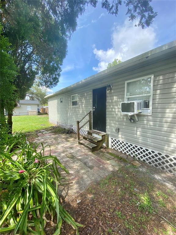 38313 Tucker Road Zephyrhills, FL 33542 - Photo 26 of 46 a view of a backyard with a garden