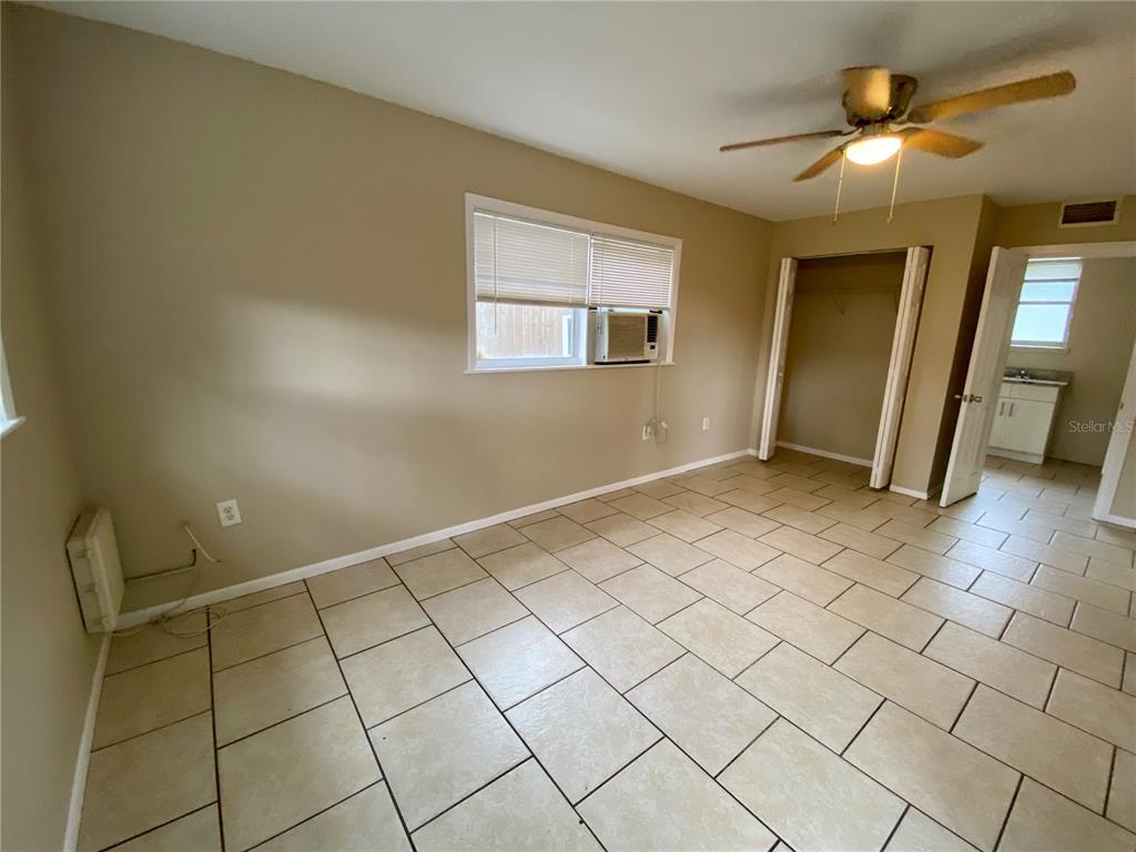38313 Tucker Road Zephyrhills, FL 33542 - Photo 3 of 46 a view of an empty room and window