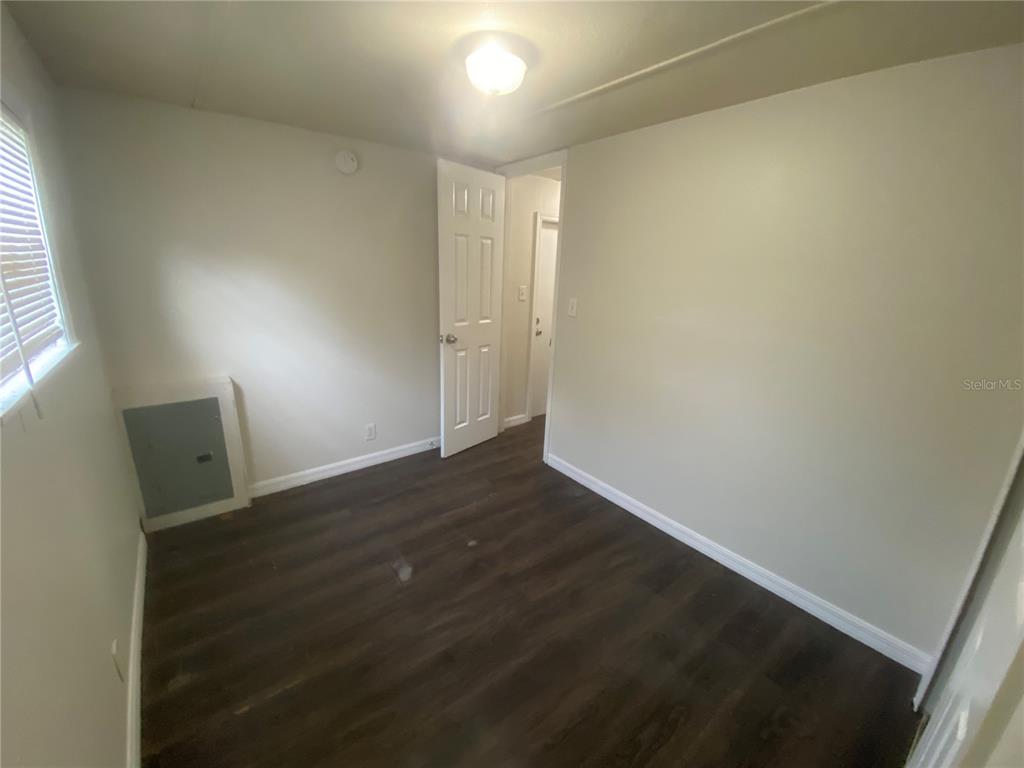 38313 Tucker Road Zephyrhills, FL 33542 - Photo 36 of 46 a view of an empty room and window