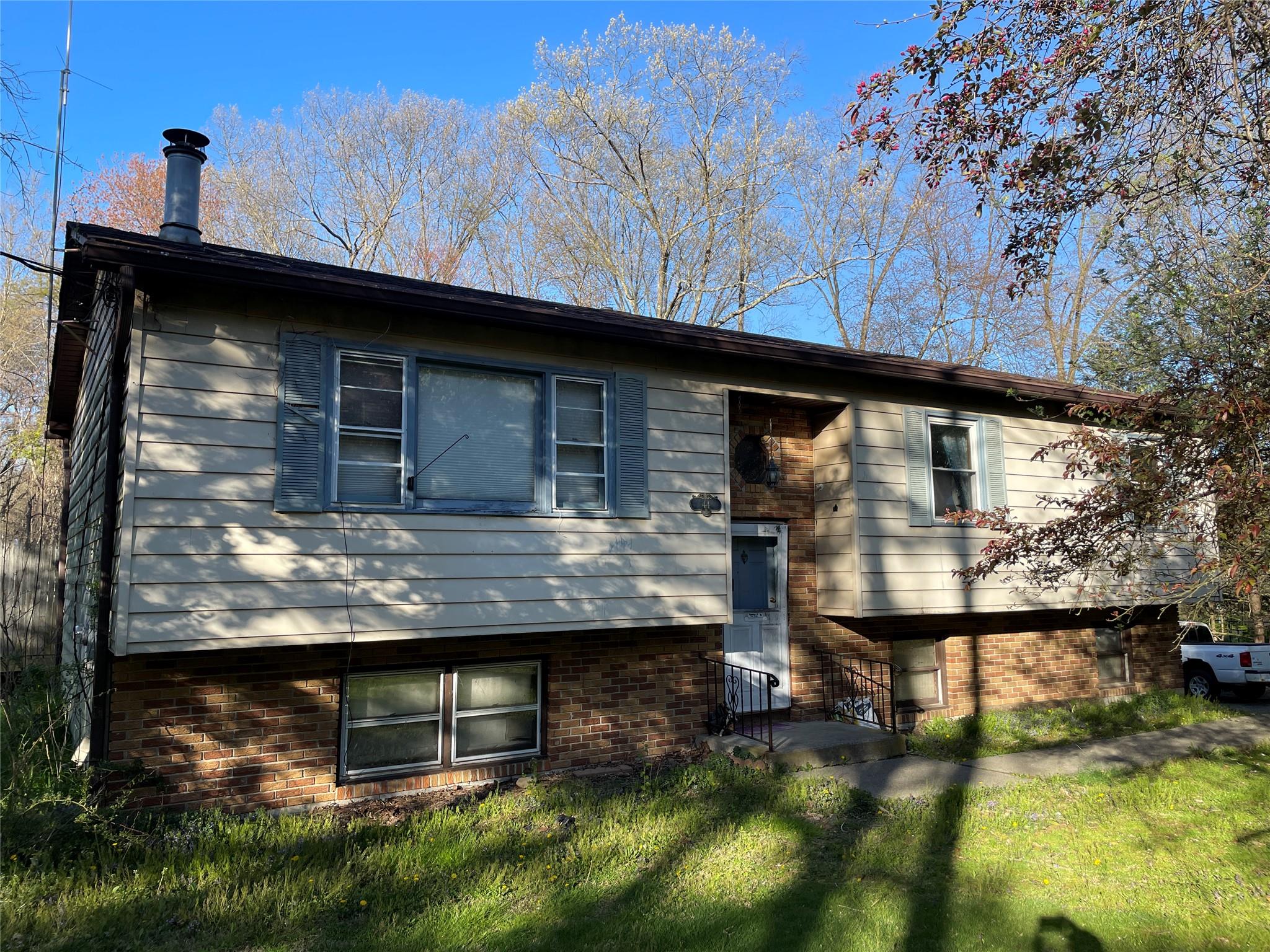 a view of a house with a balcony