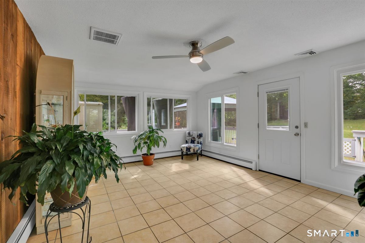 21 Silversmith Road Farmington, CT 06085 - Photo 11 of 30 Heated and cooled sunroom is a great addition to this home