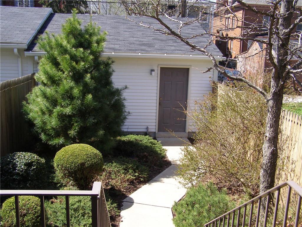 326 Hailman Street Pittsburgh, PA 15206 - Photo 9 of 22 a backyard of a house with lots of green space