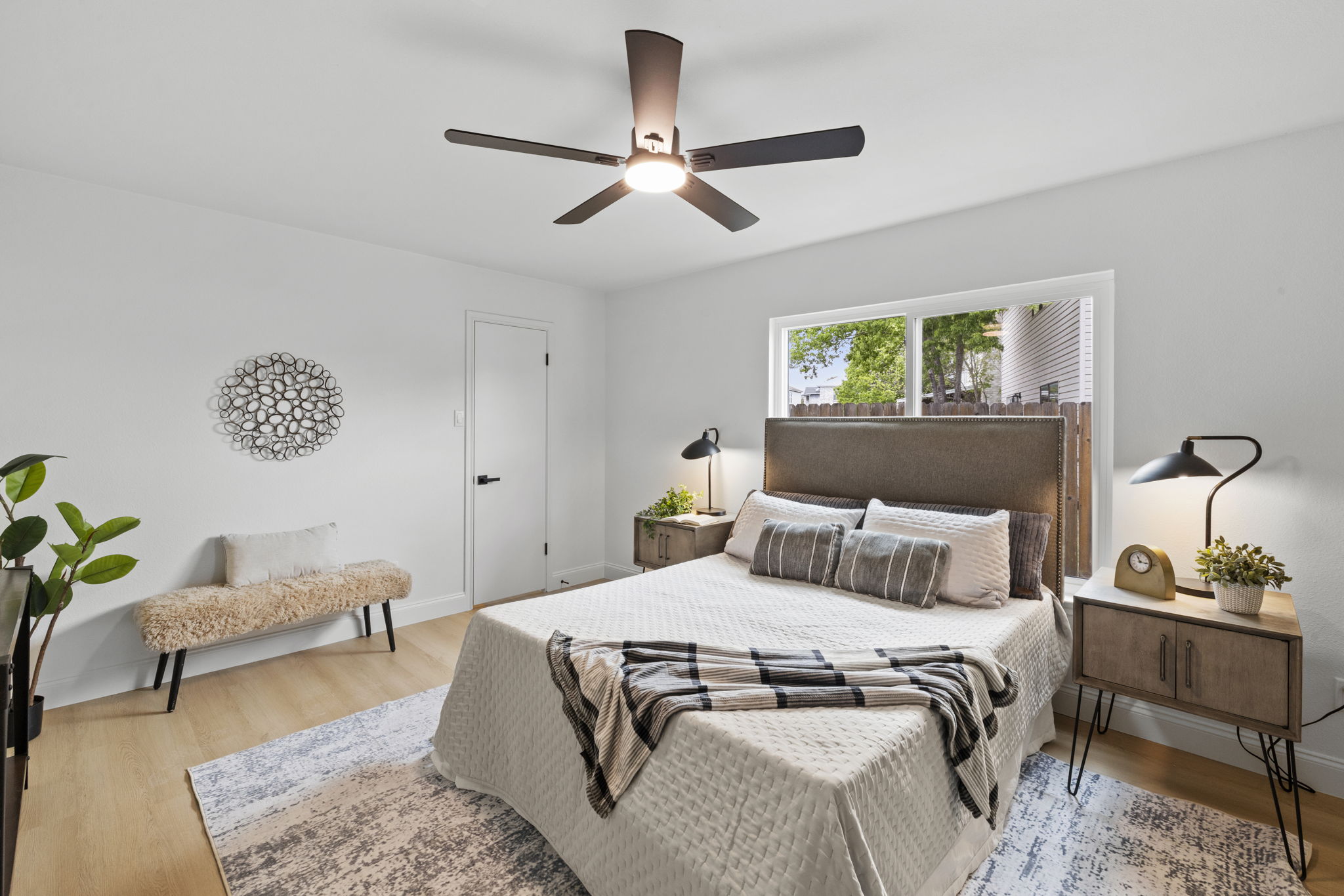 3722 Blue Cat Way Round Rock, TX 78665 - Photo 15 of 40 a bedroom with a bed and a chandelier