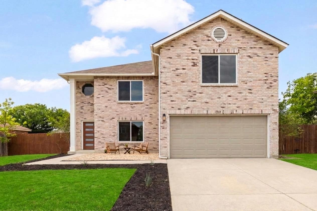 3722 Blue Cat Way Round Rock, TX 78665 - Photo 2 of 40 a front view of a house with a yard