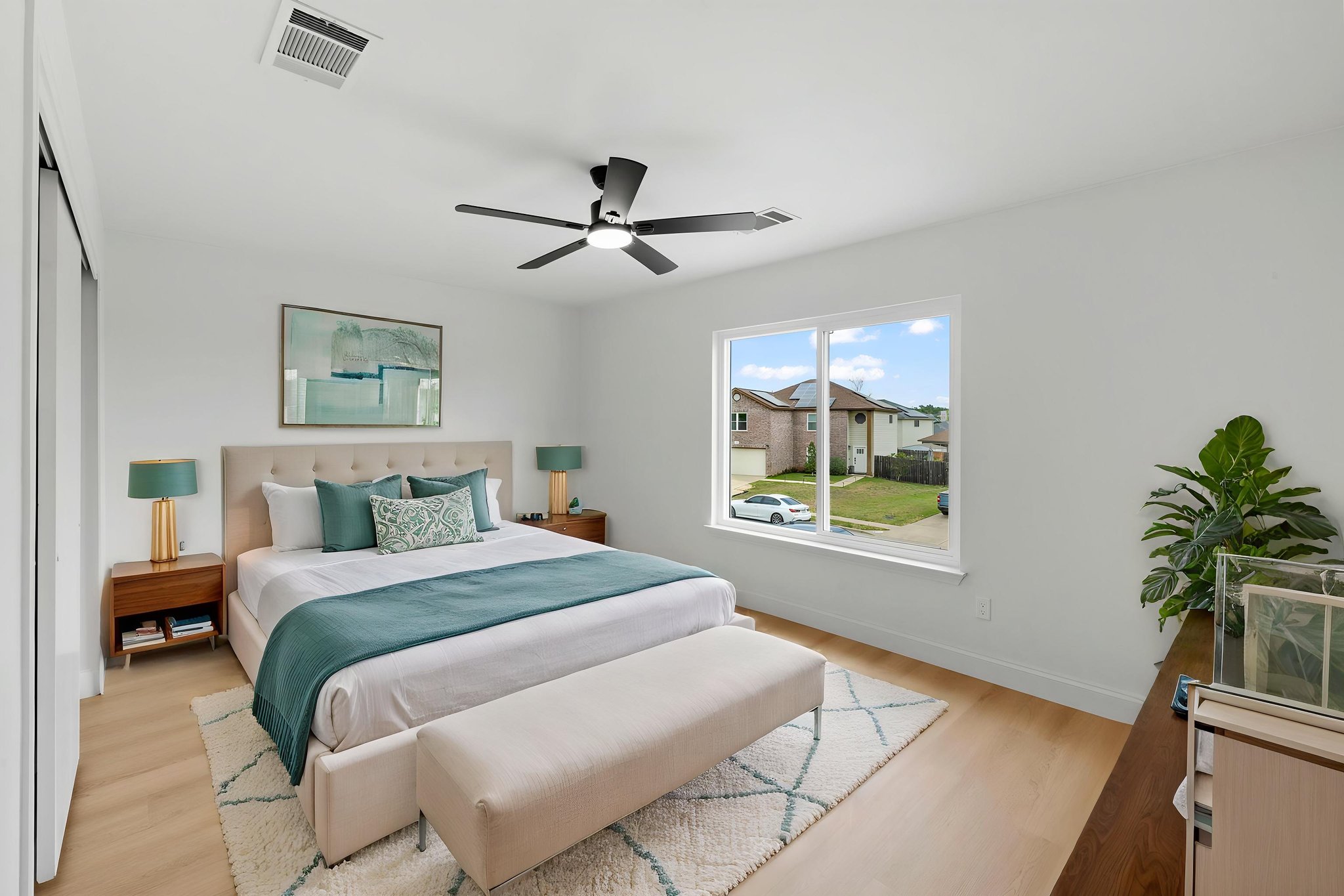 3722 Blue Cat Way Round Rock, TX 78665 - Photo 33 of 40 a bedroom with a large bed and a window