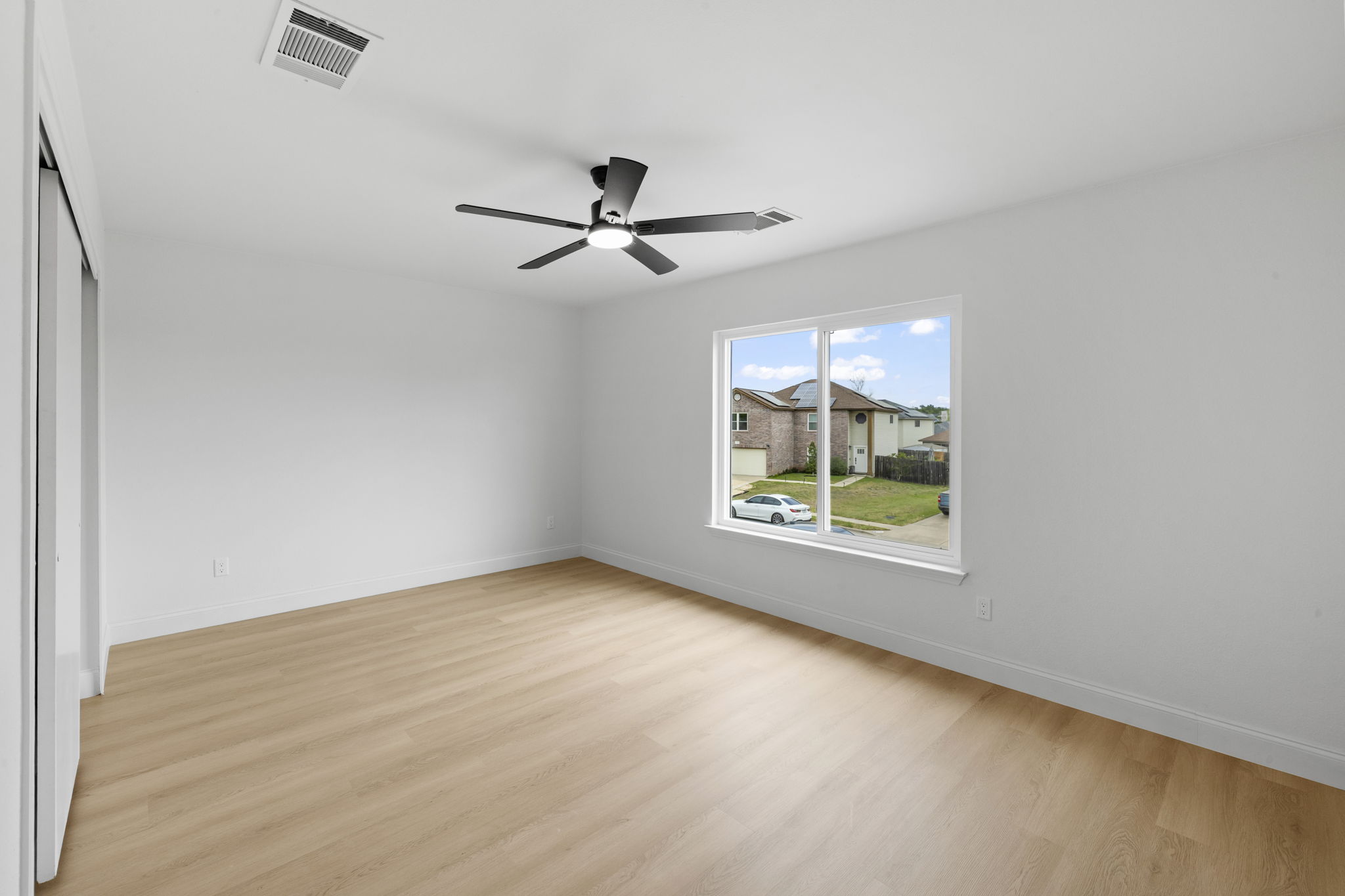 3722 Blue Cat Way Round Rock, TX 78665 - Photo 34 of 40 a view of room with hardwood floor and ceiling fan
