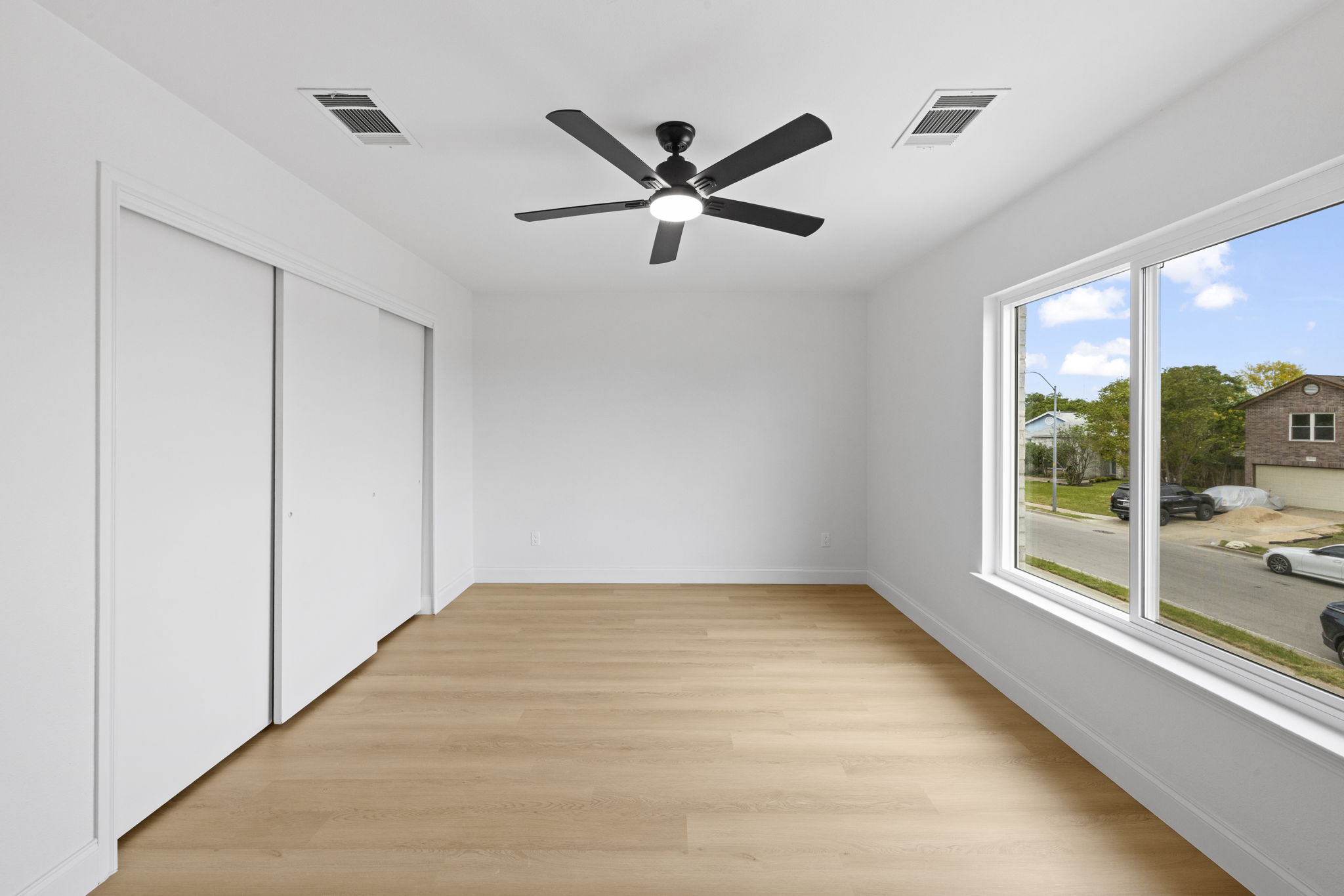 3722 Blue Cat Way Round Rock, TX 78665 - Photo 35 of 40 a view of a ceiling fan with a large window