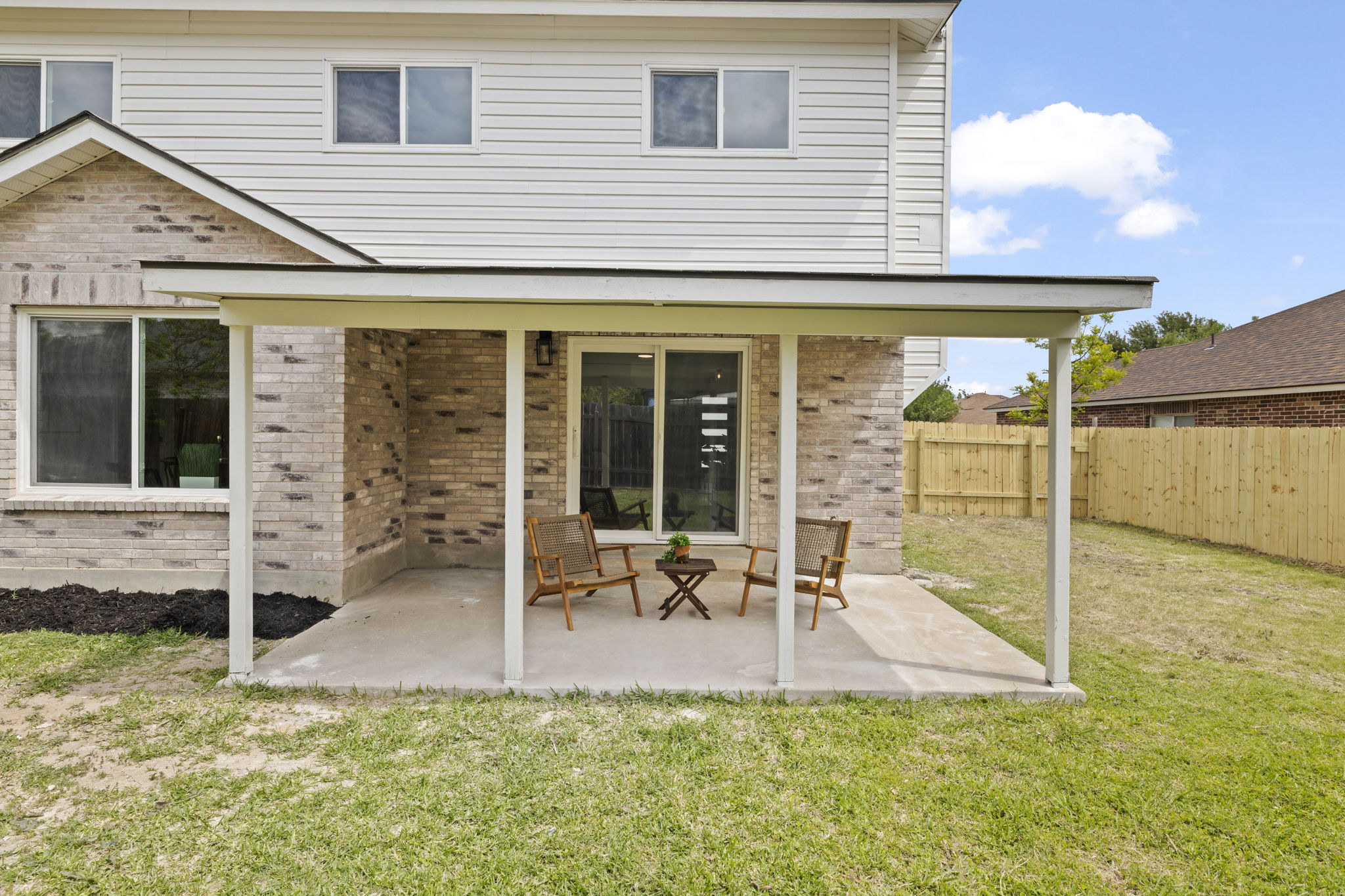 3722 Blue Cat Way Round Rock, TX 78665 - Photo 40 of 40 a view of a house with backyard and porch