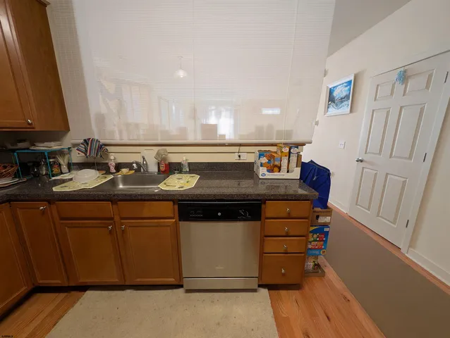 a view of a hallway with some storage area