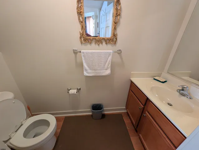 a bathroom with a toilet and a sink