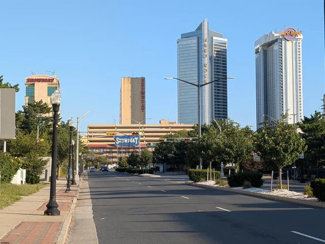 a view of a backyard with sitting area