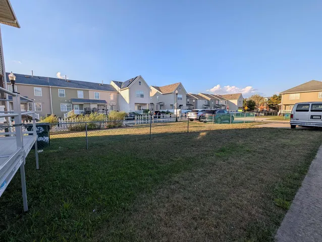 a view of a yard in front of a house