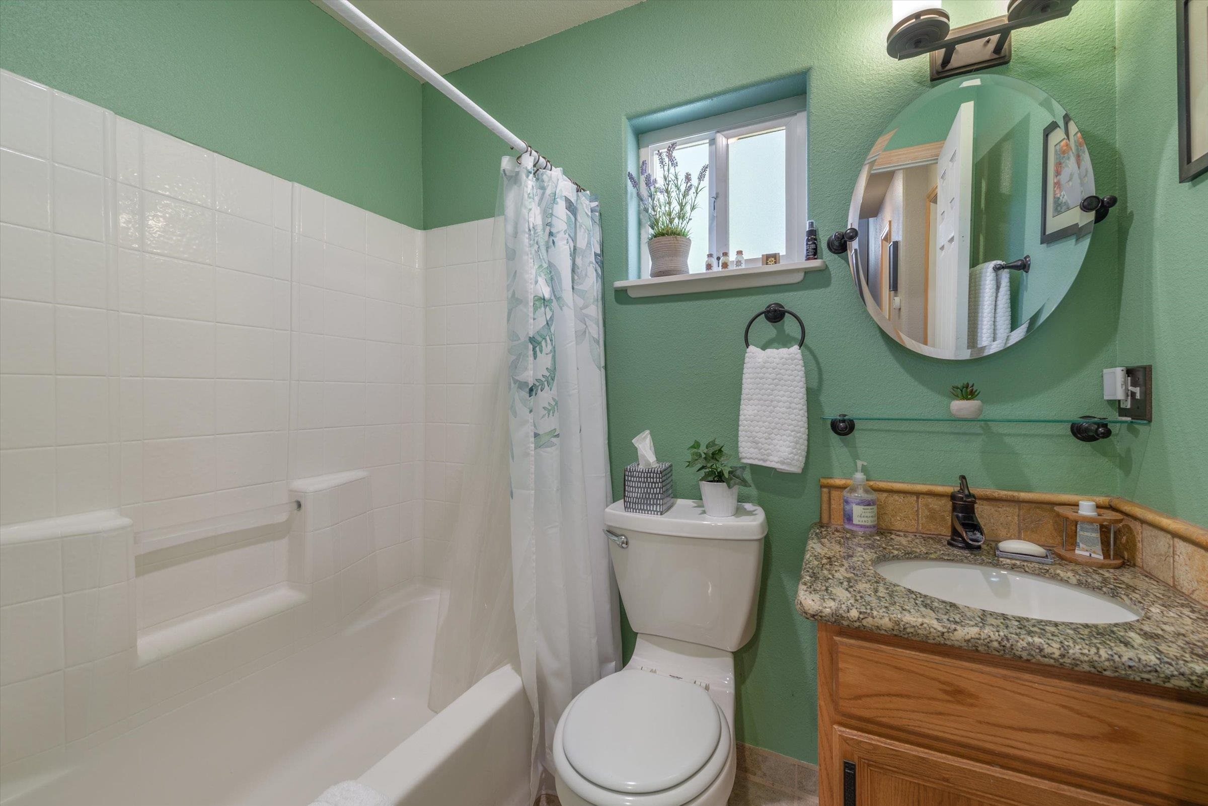 12860 Dulzura Street Truckee, CA 96161 - Photo 13 of 21 a bathroom with a granite countertop toilet sink and mirror