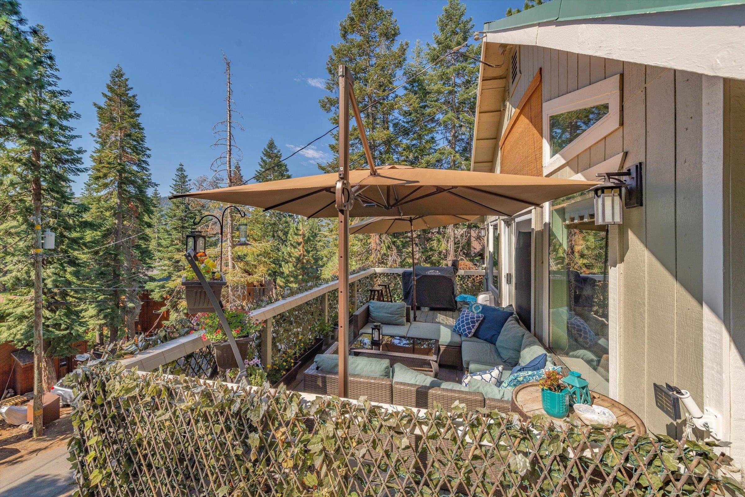 12860 Dulzura Street Truckee, CA 96161 - Photo 7 of 21 a view of balcony with chairs and iron fence