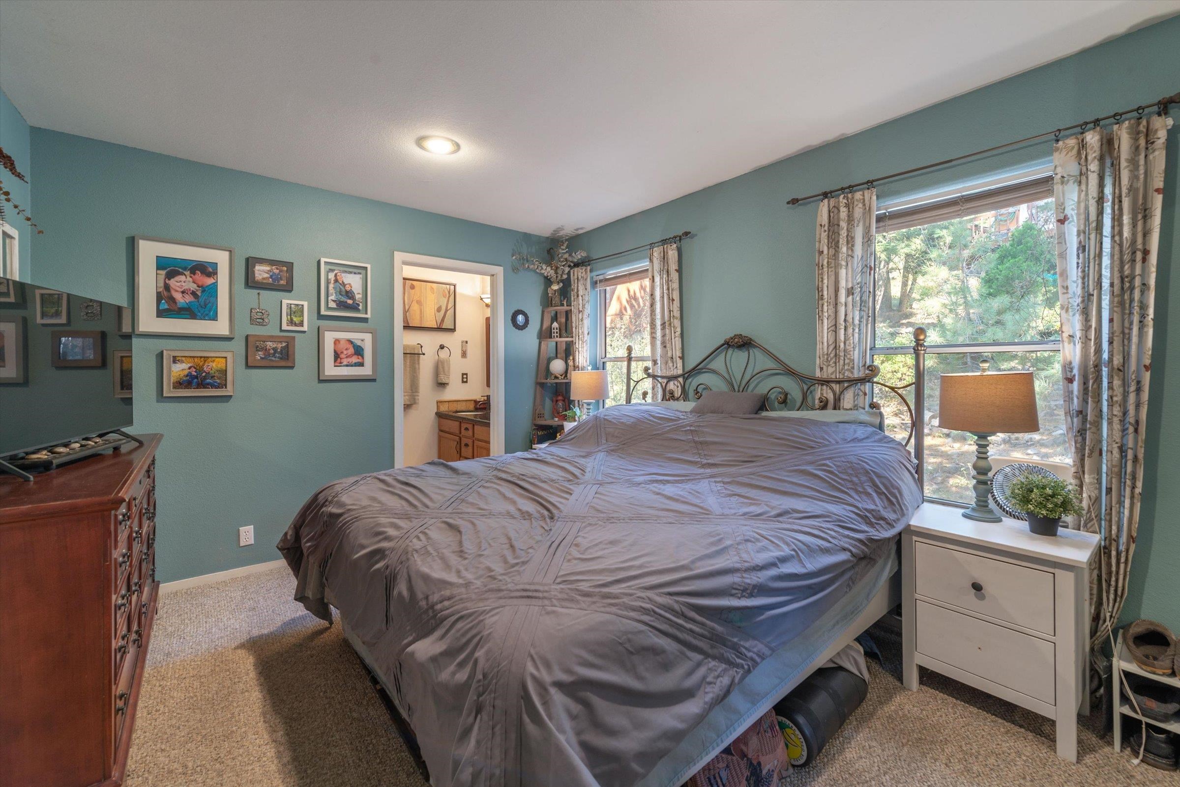 12860 Dulzura Street Truckee, CA 96161 - Photo 9 of 21 a bedroom with a bed and a window