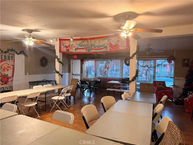 a view of a livingroom with furniture and a chandelier