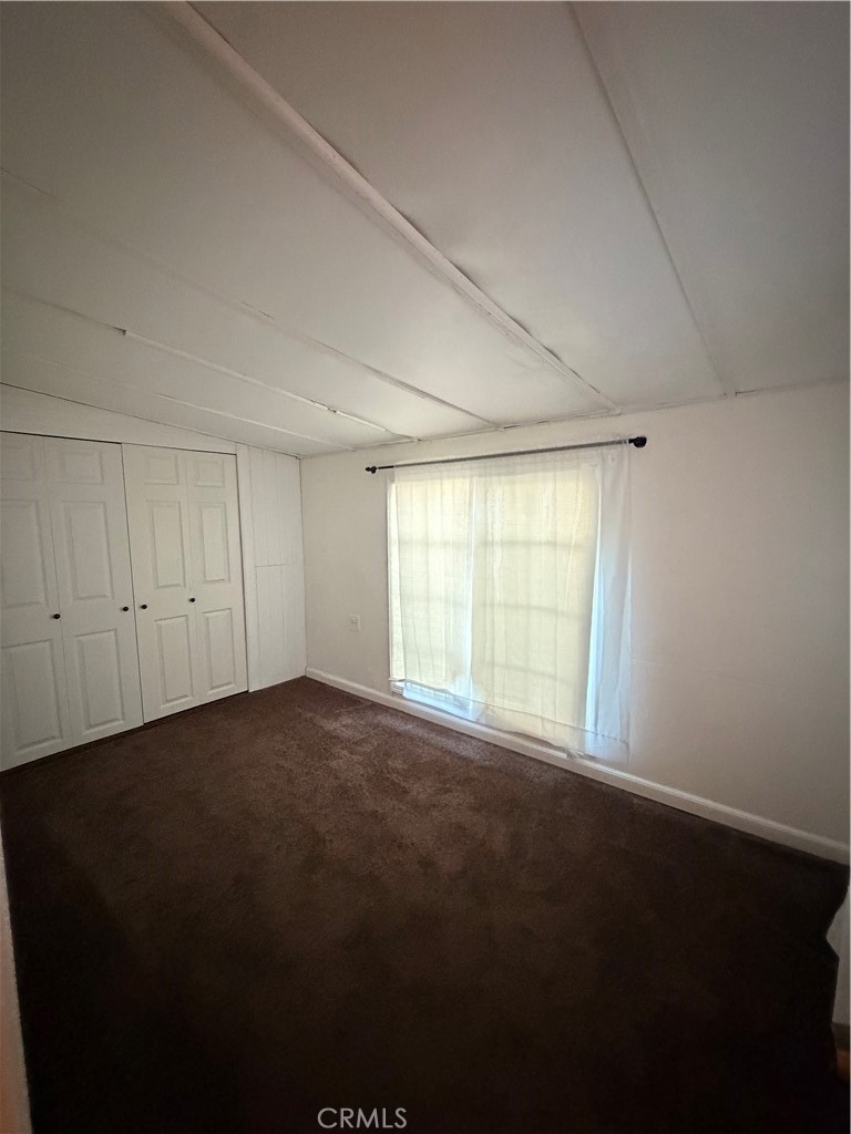 9340 Foothill Rancho Cucamonga, CA 91730 - Photo 7 of 21 a view of an empty room with a window
