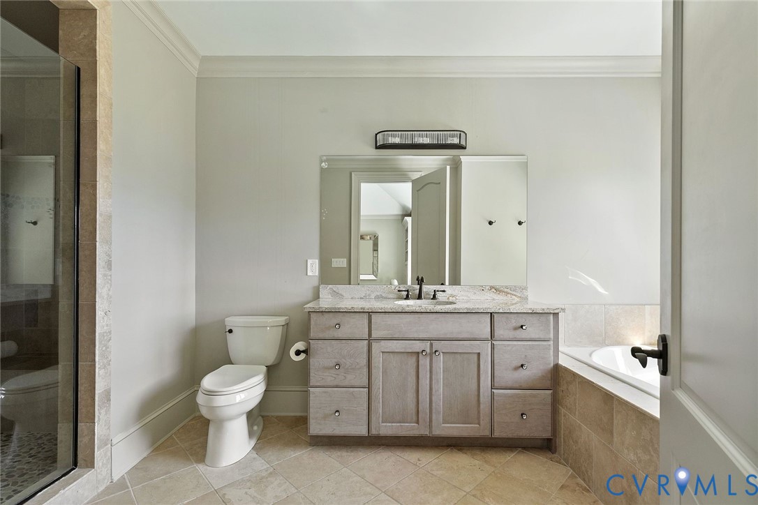 785 Oak Spring Lane Manakin-Sabot, VA 23103 - Photo 61 of 96 ensuite with tiled shower and soaking tub
