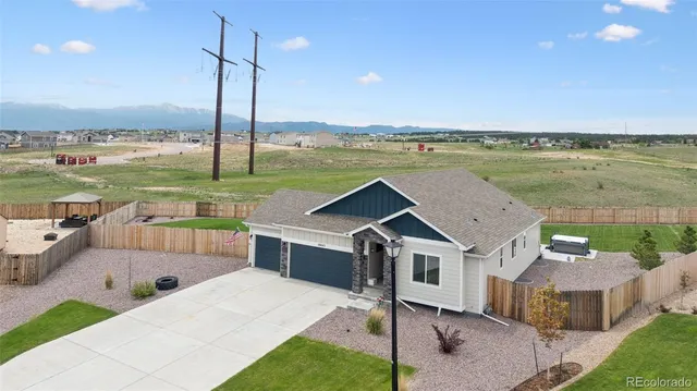 a house view with a lake view