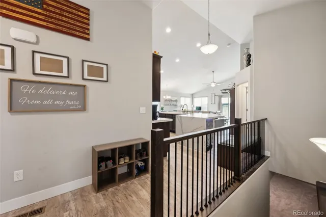 a view of a hallway with workspace