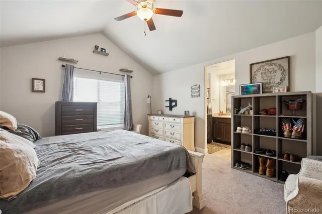 a bedroom with a bed and closet