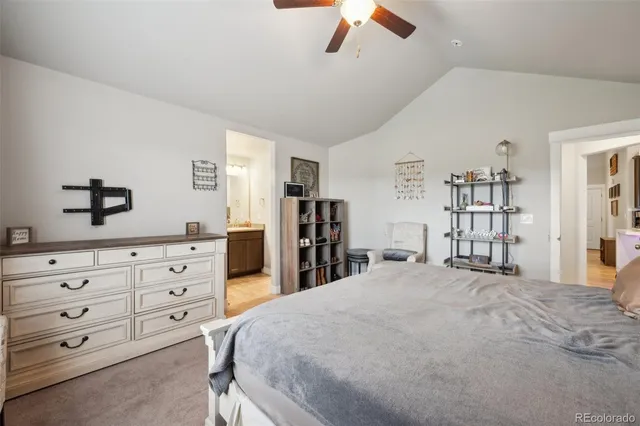 a bed room with a bed and a television