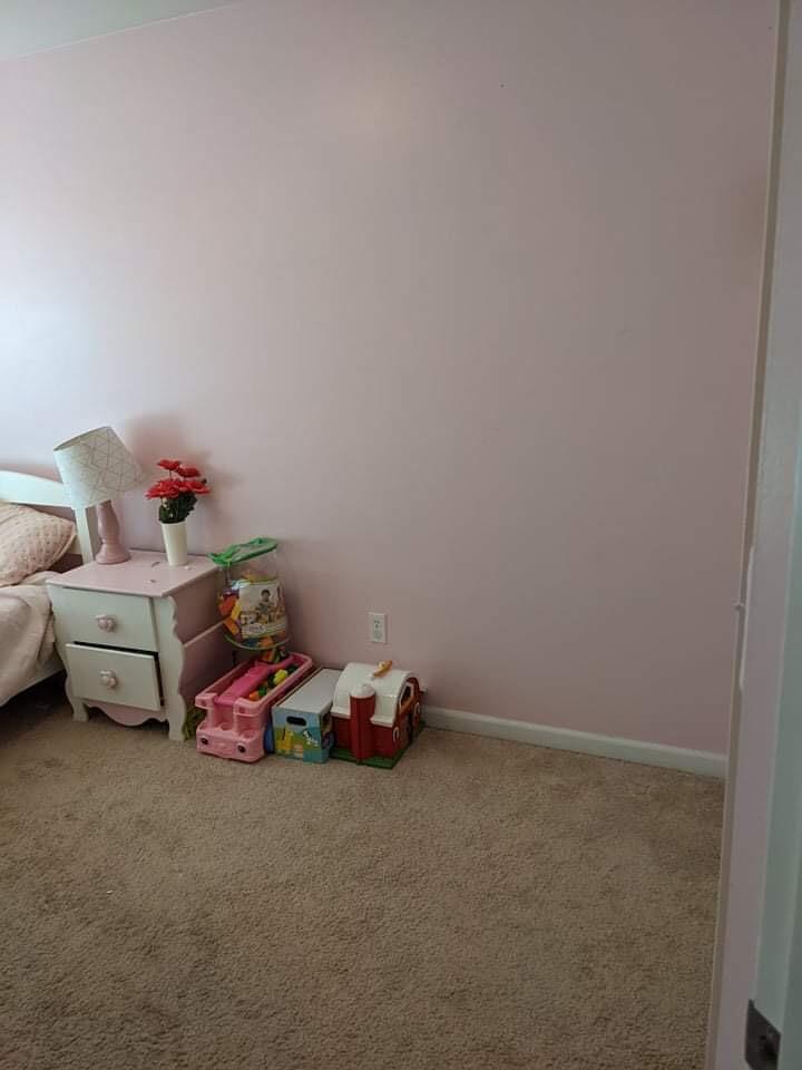 369 South Boo Road, Unit B Burns Harbor, IN 46304 - Photo 16 of 23 a bedroom with a bed and toys
