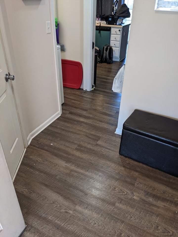 369 South Boo Road, Unit B Burns Harbor, IN 46304 - Photo 5 of 23 a room with wooden floor and furniture