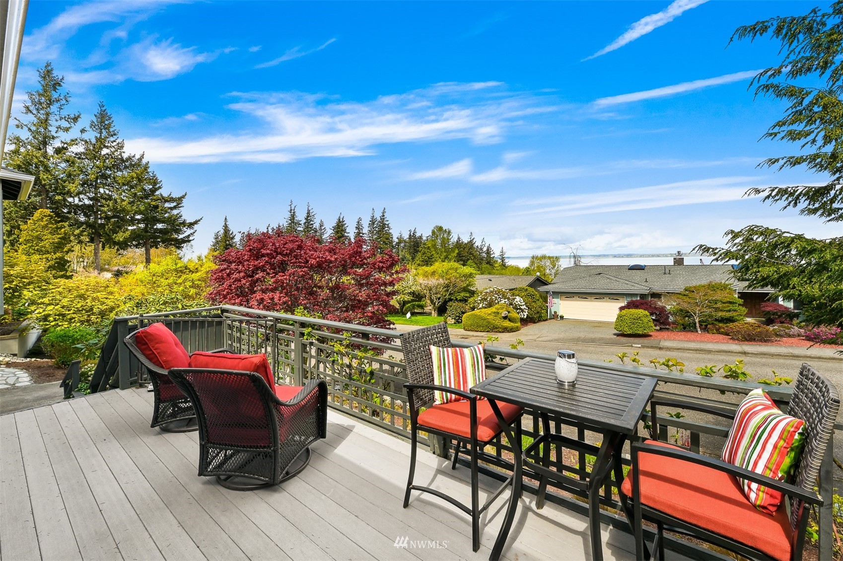 232 Bayside Road Bellingham, WA 98225 - Photo 27 of 40 a view of a chairs and table on the wooden deck