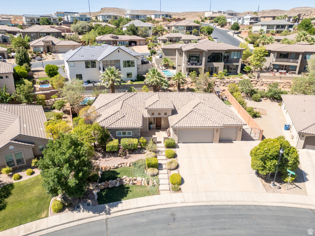 1257 West 2320 South St. George, UT 84770 - Photo 53 of 55 Southwestern-style residence featuring a tile roof, a two-car garage, and a concrete driveway