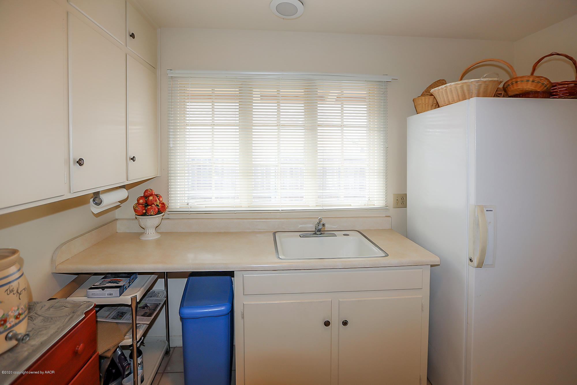 6908 Calumet Road Amarillo, TX 79106 - Photo 34 of 40 a room with storage and utility