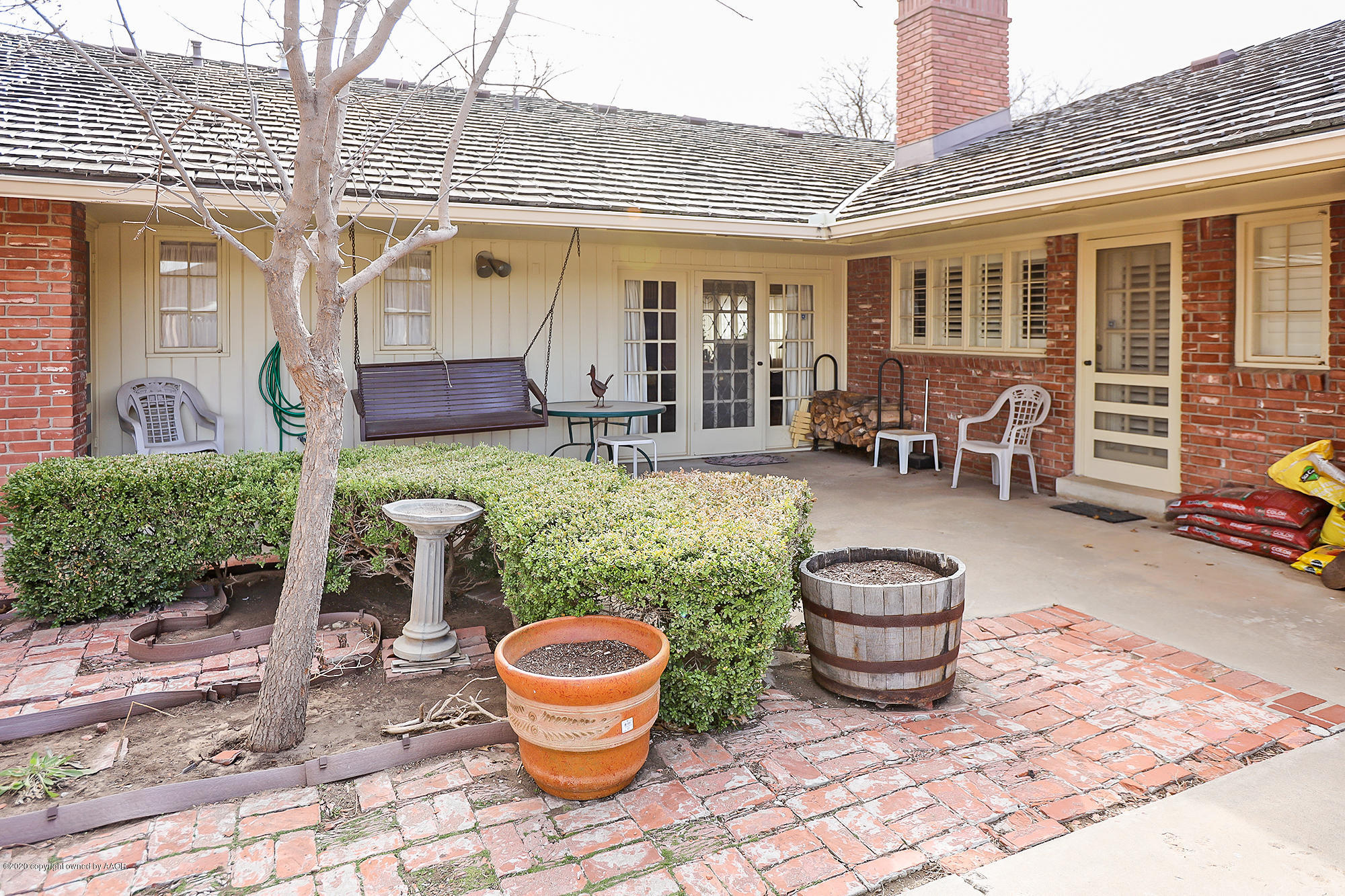 6908 Calumet Road Amarillo, TX 79106 - Photo 36 of 40 a outdoor space with patio furniture and potted plants