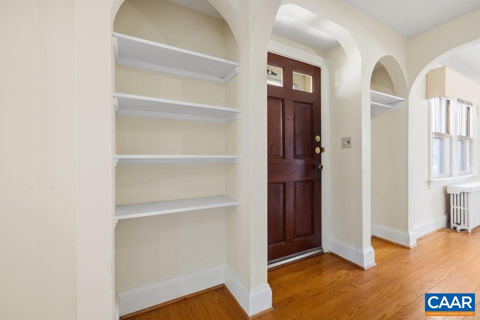 1201 Avon Street Charlottesville, VA 22902 - Photo 18 of 71 a view of walk in closet with empty racks