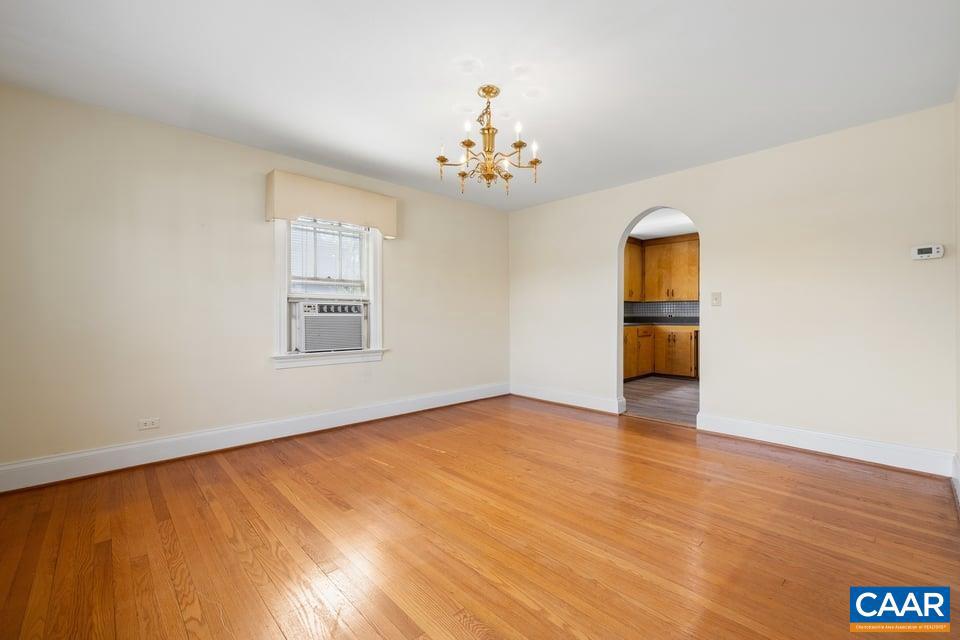 1201 Avon Street Charlottesville, VA 22902 - Photo 24 of 71 wooden floor in an empty room with a window