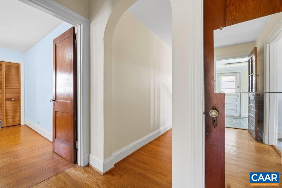 1201 Avon Street Charlottesville, VA 22902 - Photo 33 of 71 a view of a hallway with wooden floor