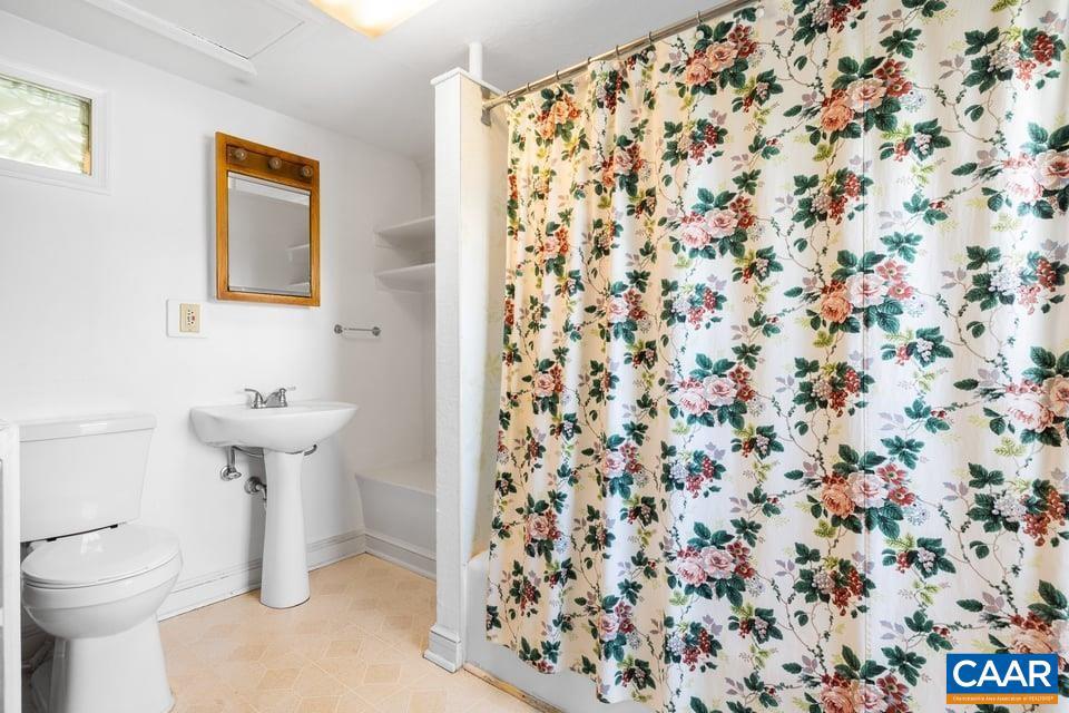 1201 Avon Street Charlottesville, VA 22902 - Photo 37 of 71 a bathroom with a sink toilet and shower