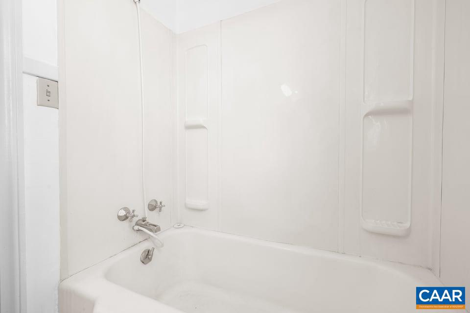 1201 Avon Street Charlottesville, VA 22902 - Photo 39 of 71 a white bath tub sitting next to a white sink