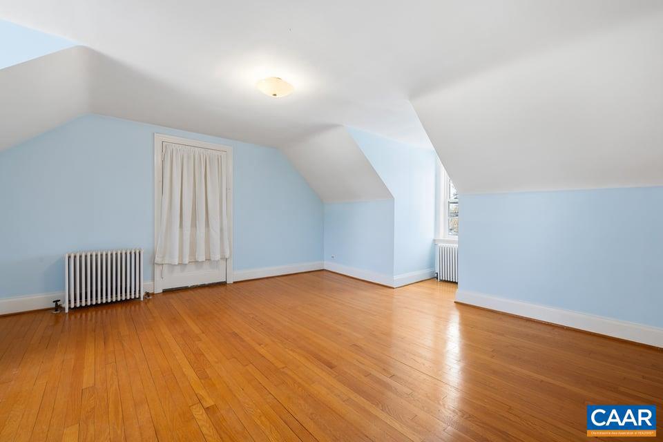 1201 Avon Street Charlottesville, VA 22902 - Photo 45 of 71 a view of an empty room and wooden floor