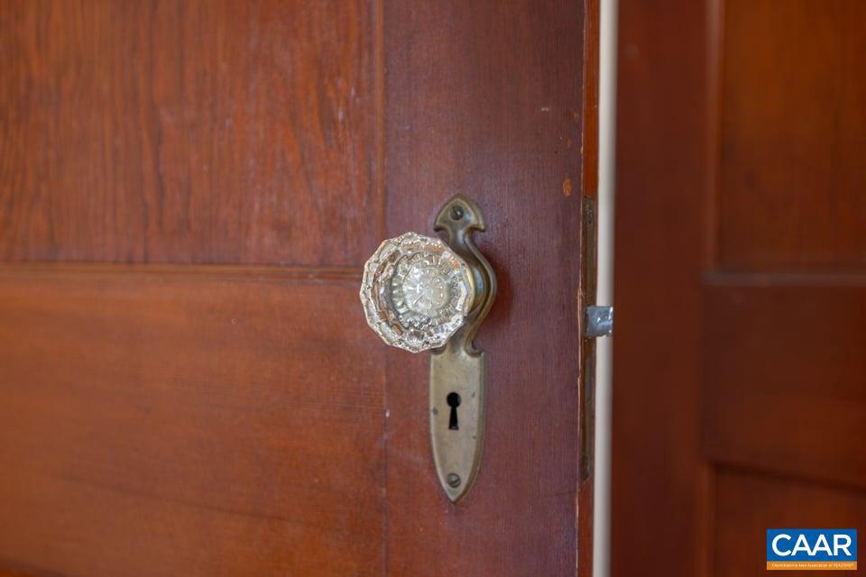 1201 Avon Street Charlottesville, VA 22902 - Photo 50 of 71 a picture of a bathroom with a shower curtain and a clock