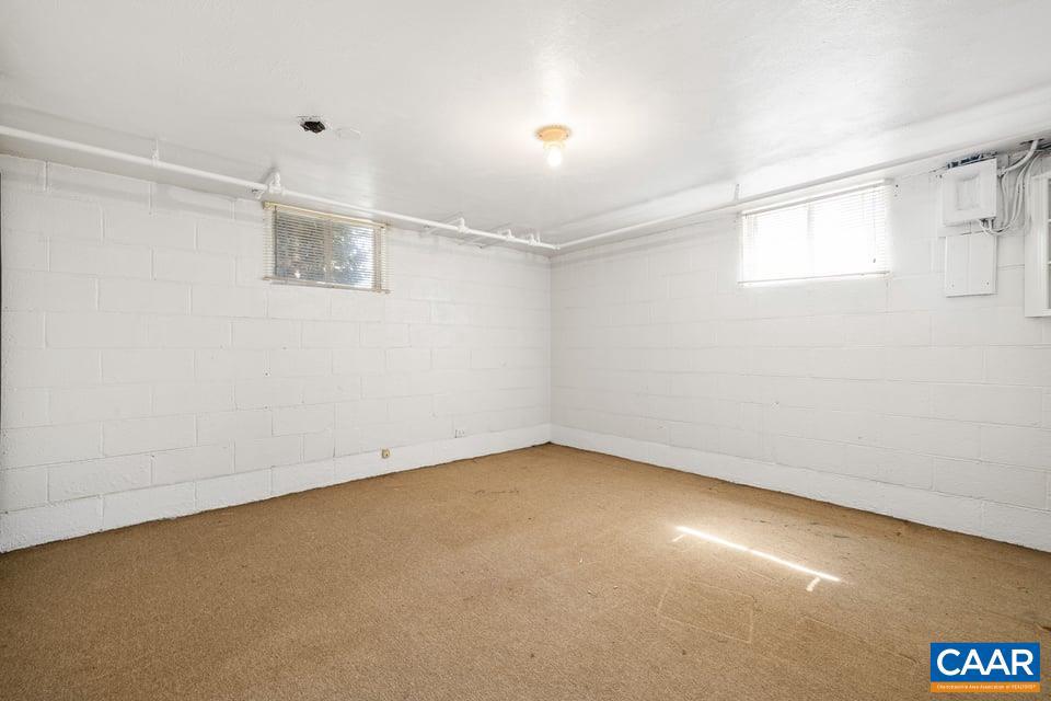 1201 Avon Street Charlottesville, VA 22902 - Photo 58 of 71 an empty room with a empty space and windows