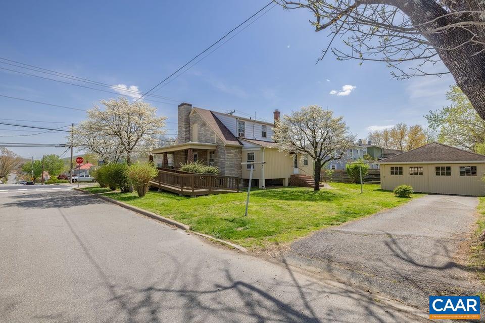 1201 Avon Street Charlottesville, VA 22902 - Photo 63 of 71 a house with green field in front of it