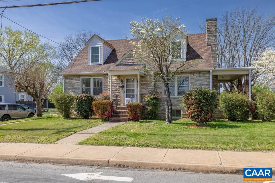 1201 Avon Street Charlottesville, VA 22902 - Photo 70 of 71 a front view of a house with a yard and potted plants