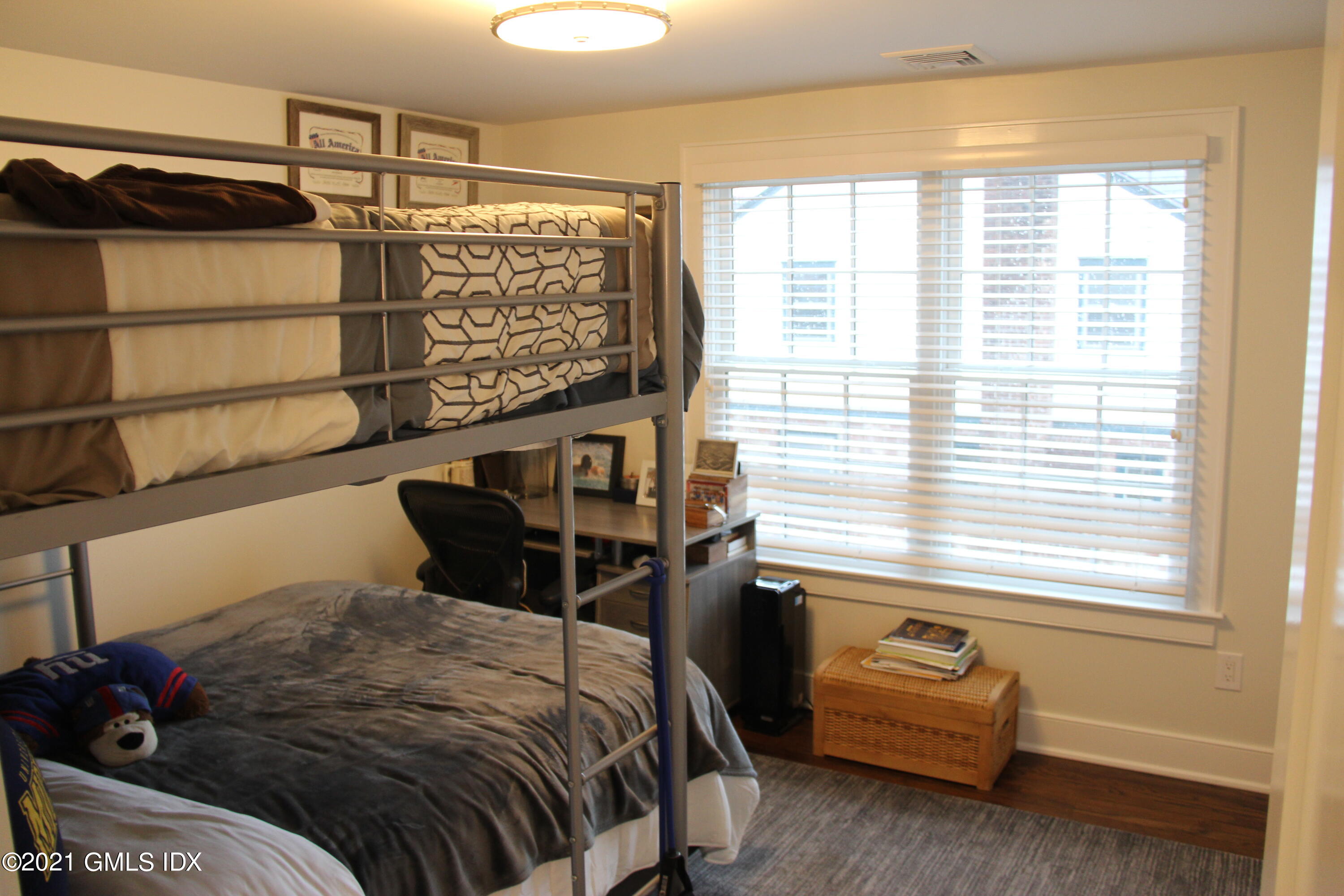 40 Strickland Road Cos Cob, CT 06807 - Photo 11 of 22 a bedroom with a bed and a window