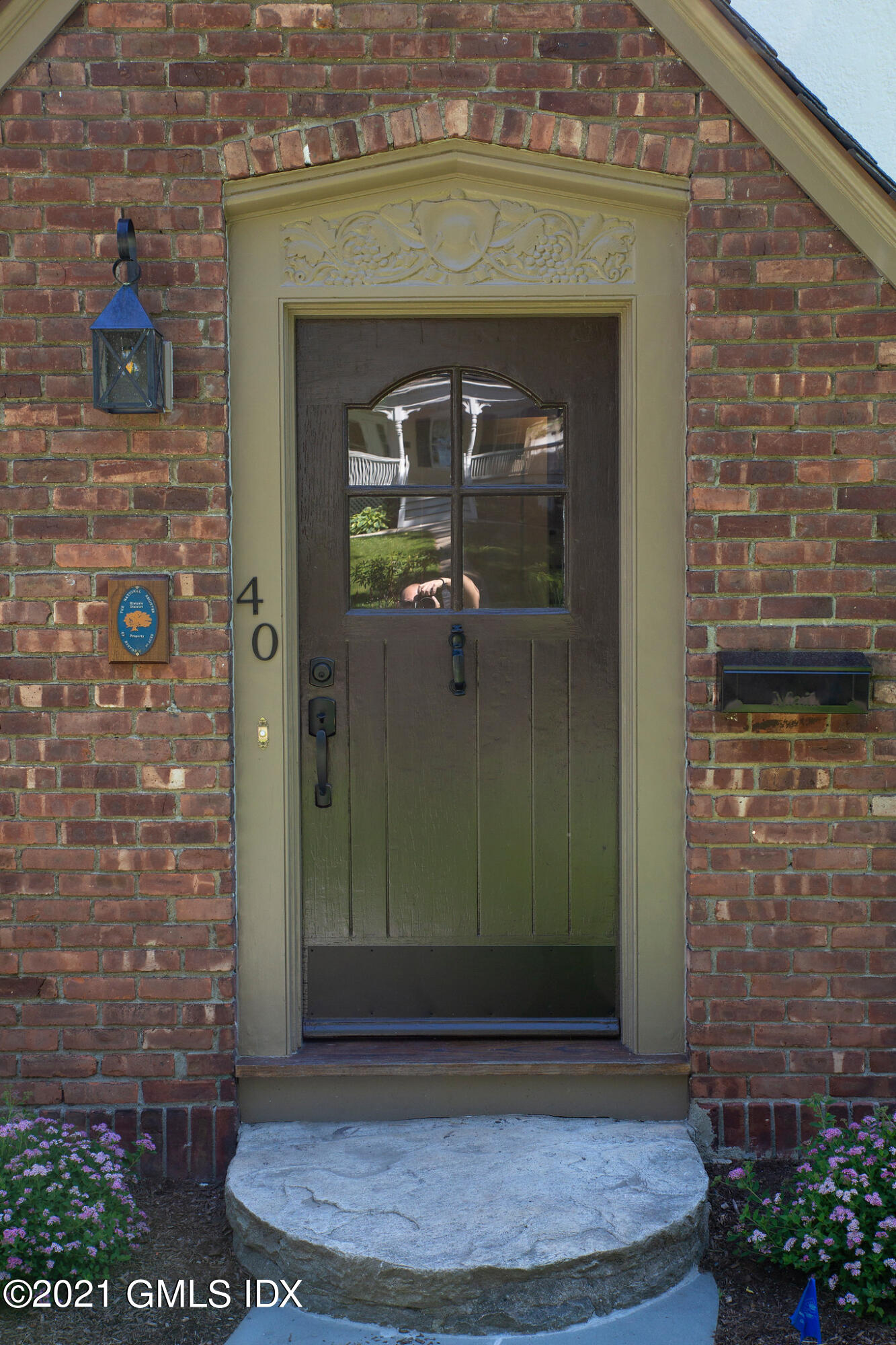 40 Strickland Road Cos Cob, CT 06807 - Photo 16 of 22 a front view of a house