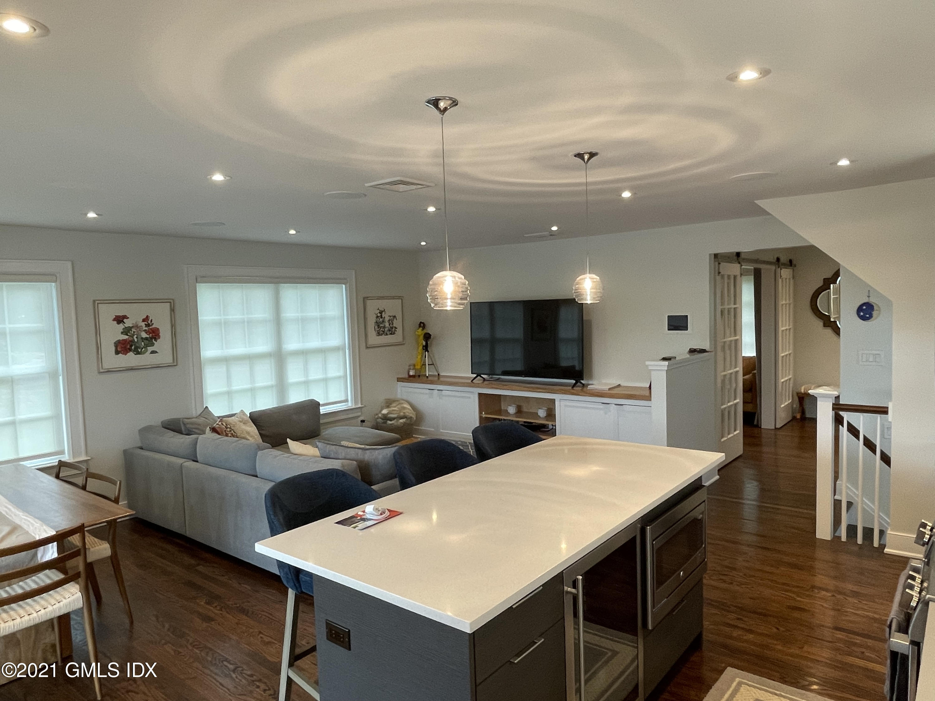 40 Strickland Road Cos Cob, CT 06807 - Photo 4 of 22 a large living room with stainless steel appliances