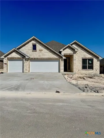 a front view of a house with windows