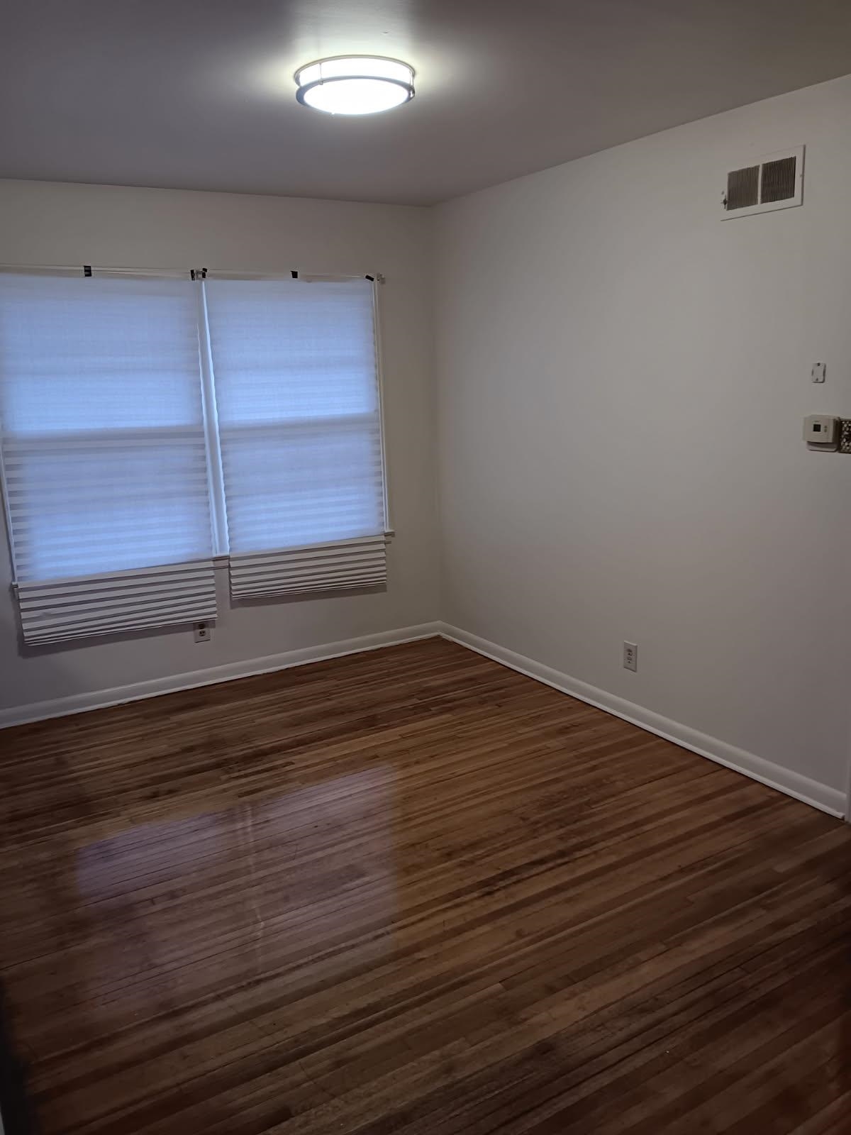 1852 Patrick Road Memphis, TN 38114 - Photo 4 of 15 Unfurnished room with dark wood-style floors and baseboards