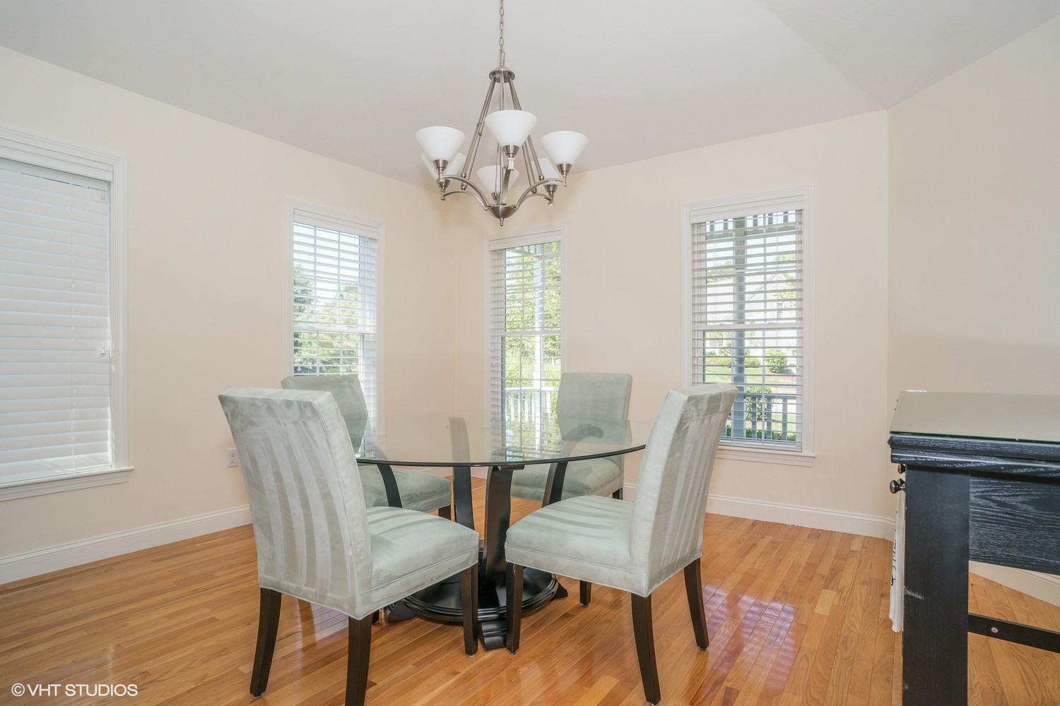 68 Brookside Road Bourne, MA 02532 - Photo 7 of 15 a view of a dining room with furniture window and wooden floor